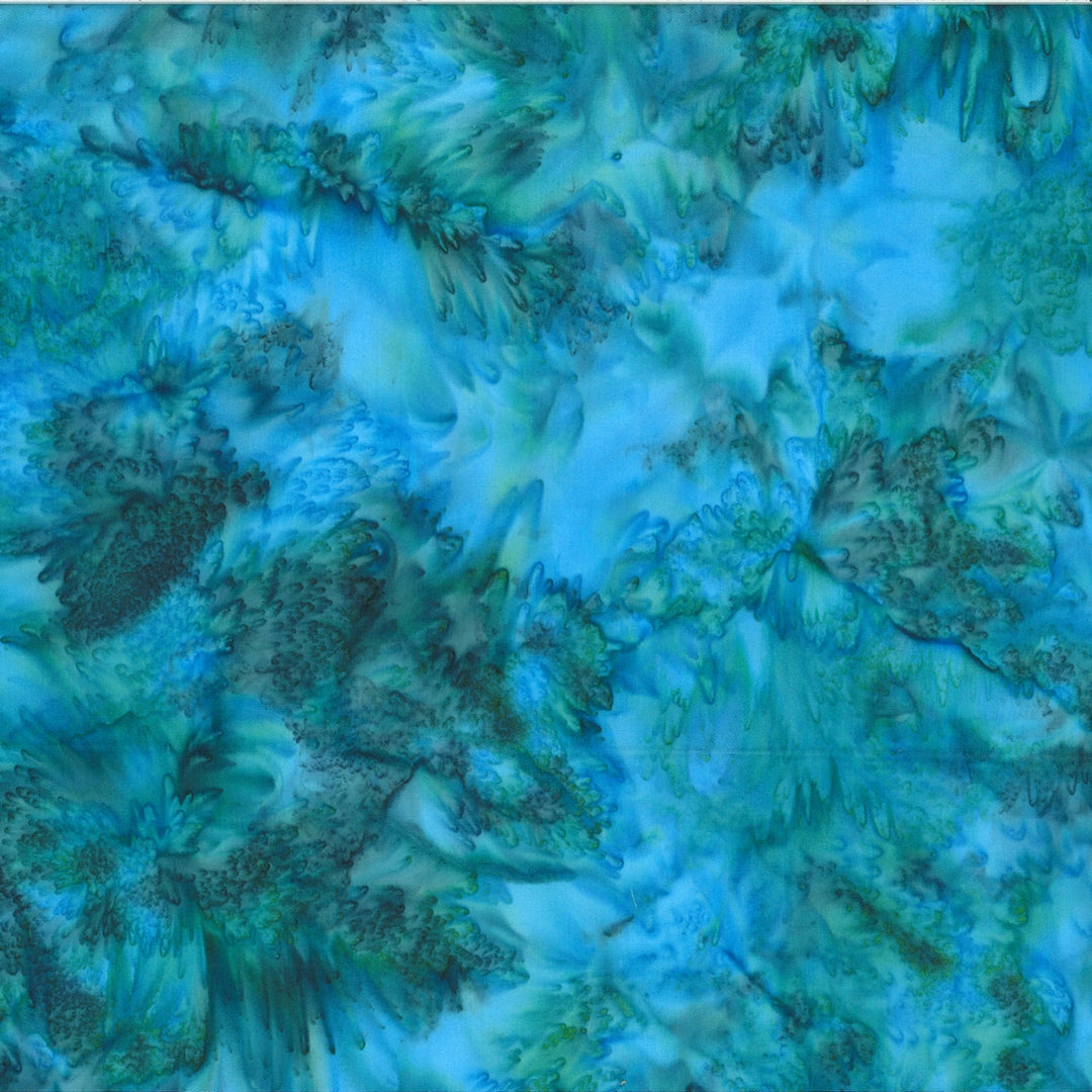 Close-up of a textured blue and green fabric surface