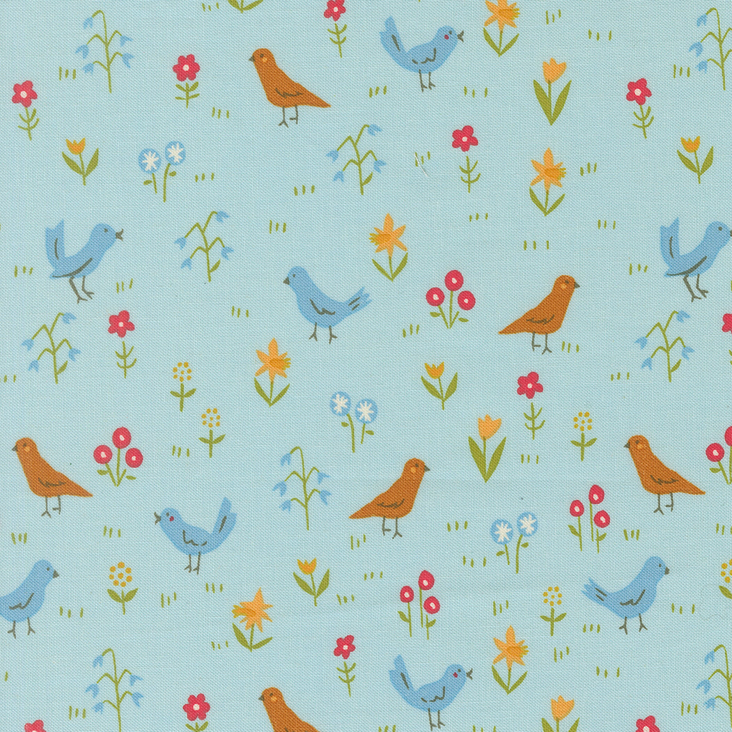 Pattern of birds and flowers on a light blue background