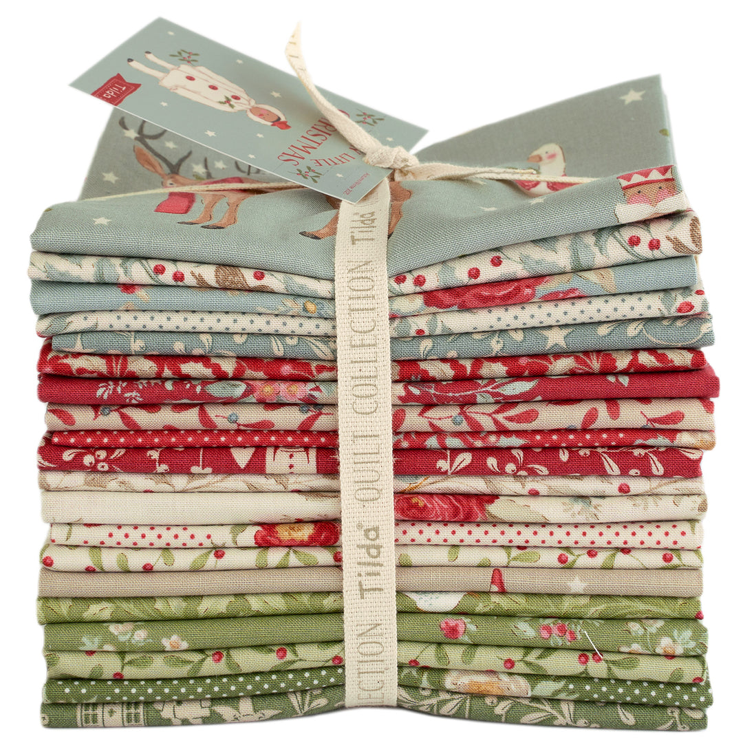Stack of fabric bundles with a visible brand label on a white background