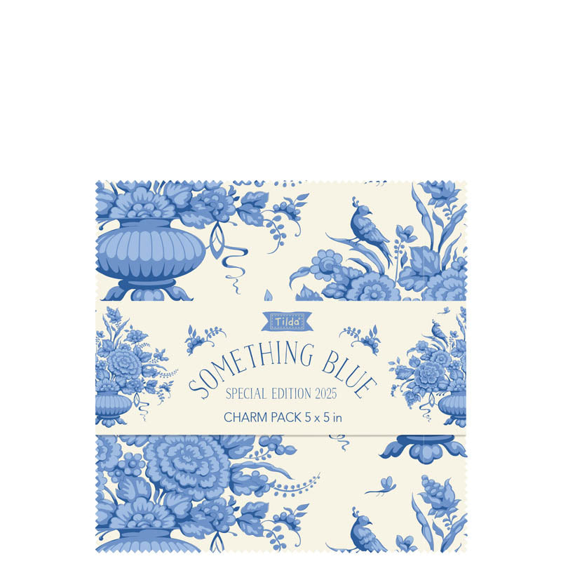 Charm pack with blue floral and bird design on a white background