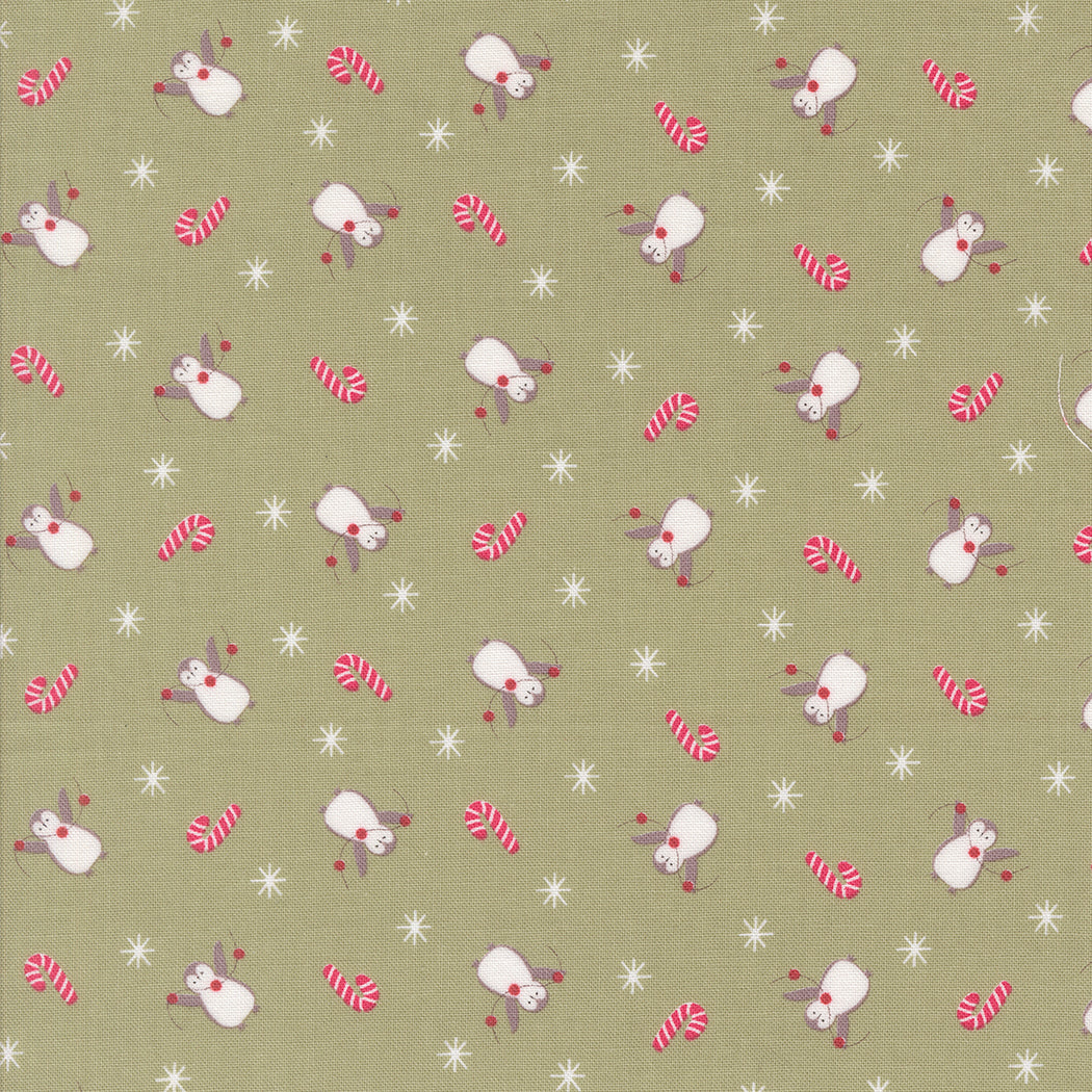 Pattern of penguins and candy canes on a green background