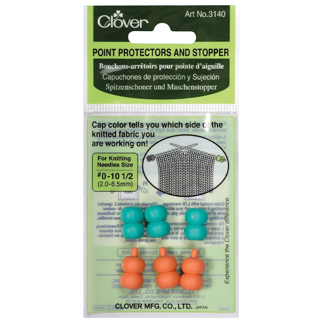 package of point protectors or stoppers. 3 aqua and 3 orange. 