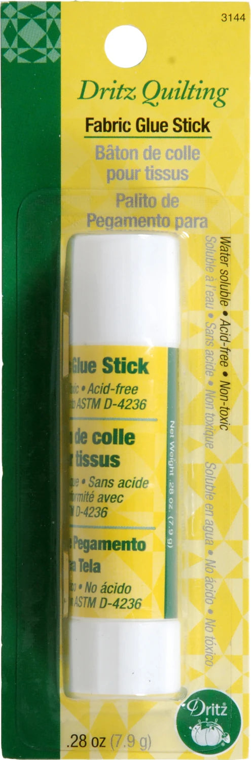 Dritz Quilting Fabric Glue Stick packaging with green and white design