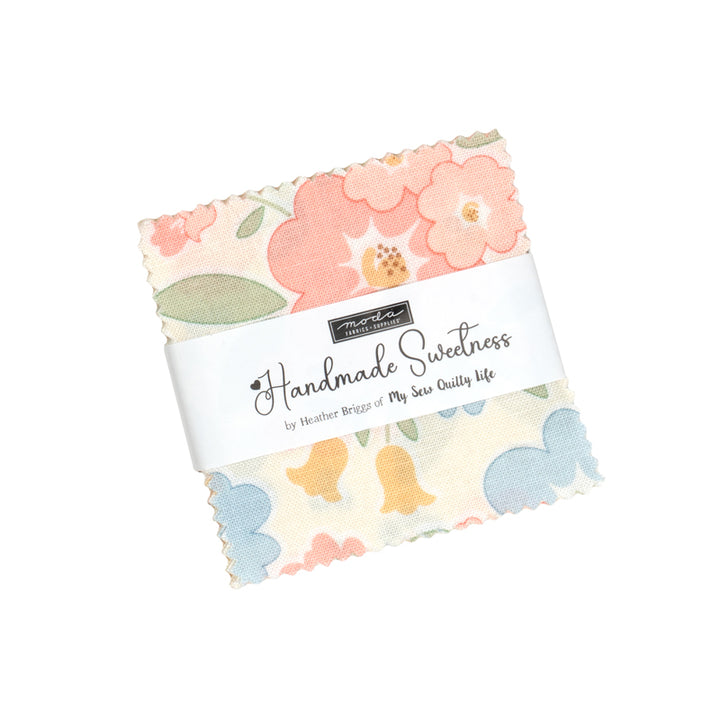 Pack of floral fabric squares with a brand label on a white background
