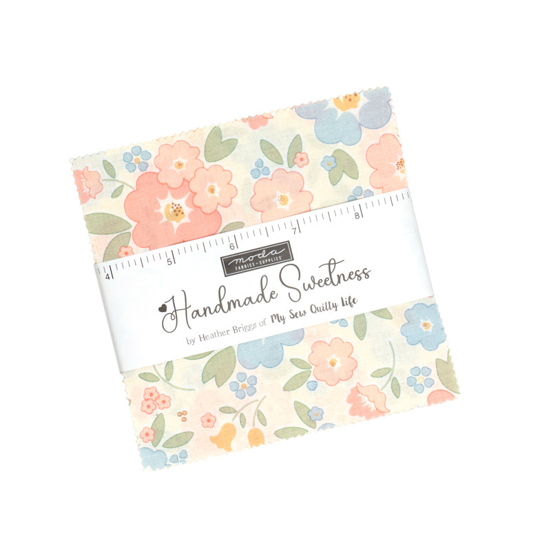 Pack of fabric with floral pattern and 'Handmade Sweetness' branding on a white background