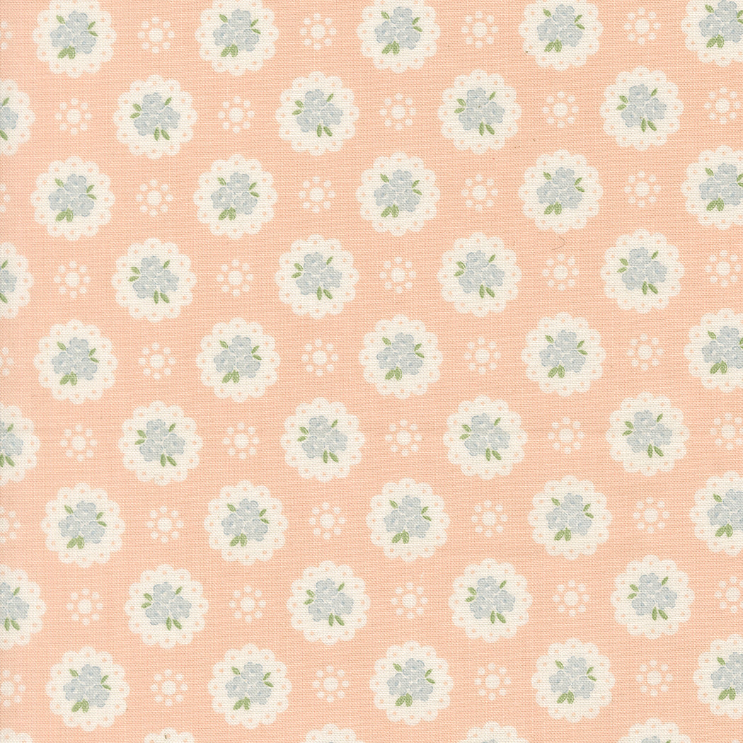 Pattern of small flowers on a peach background
