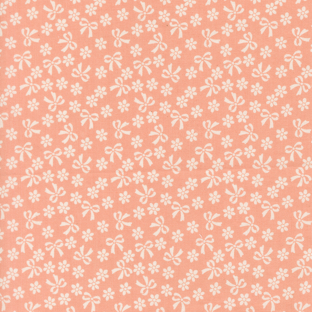Pattern of white bows and flowers on a pink background