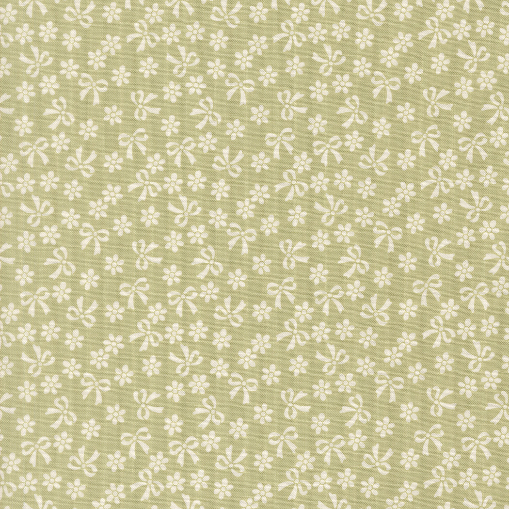 Pattern of white bows and flowers on a green background