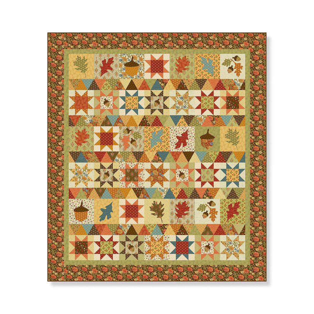 Colorful quilt with autumn-themed patterns on a white background