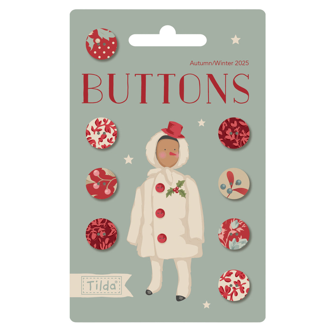 Packaging of Tilda buttons with a person wearing a coat and buttons on a light gray background