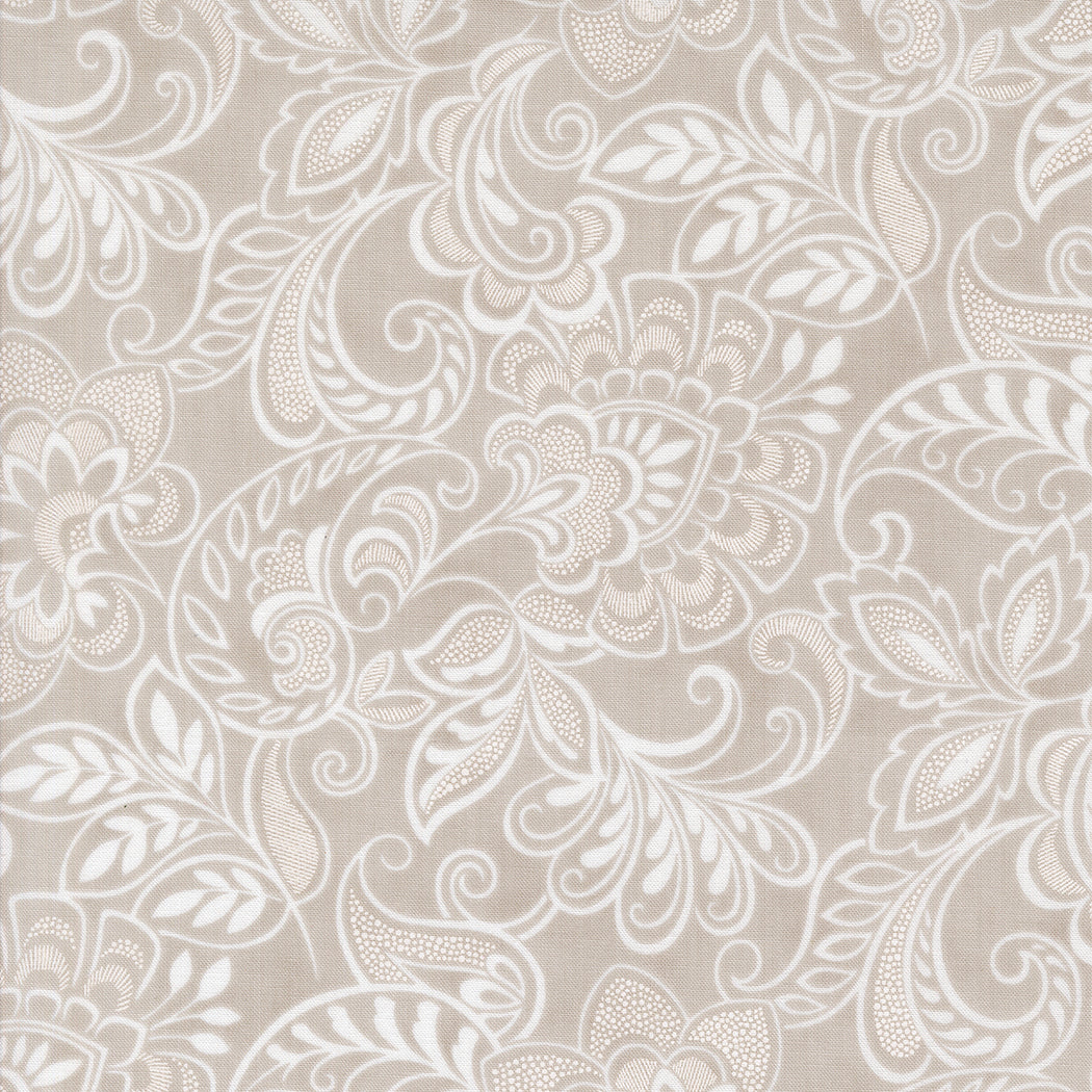 fabric swatch with a white floral damask pattern on a stone gray background