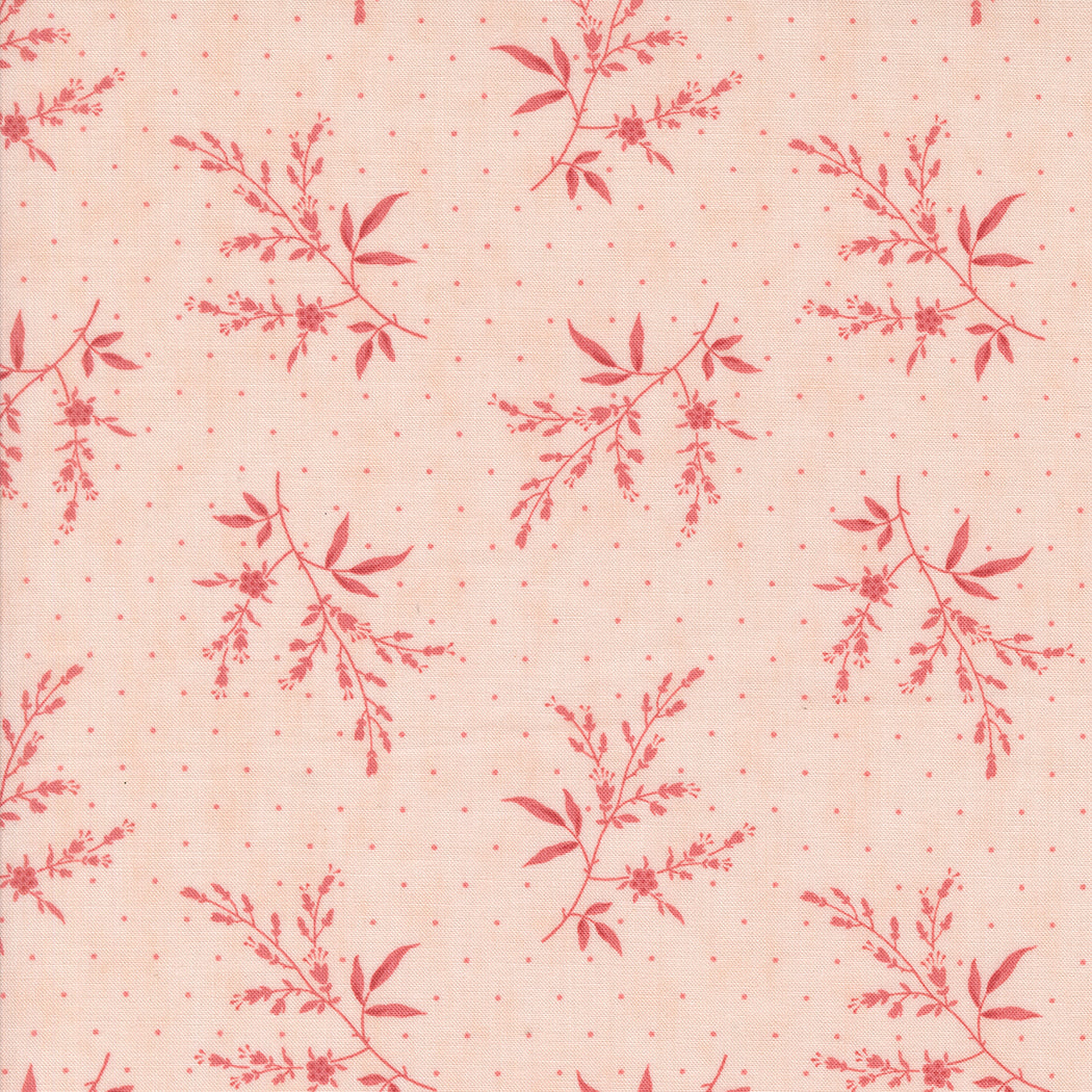 fabric swatch with small pink florals and greenery sprinkled on a blush background with pink dots