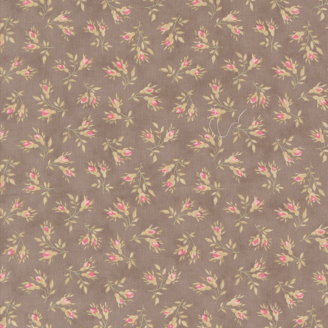 fabric swatch of small pink rosebud florals on a slate gray background