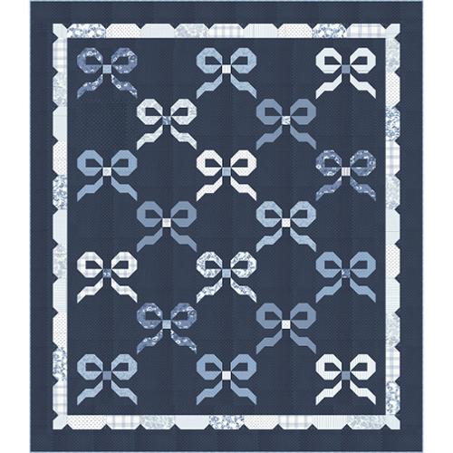 Quilt with a navy background and blue and white bows