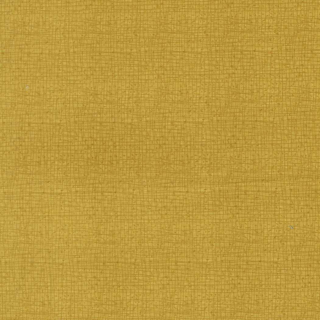 Textured yellow fabric pattern