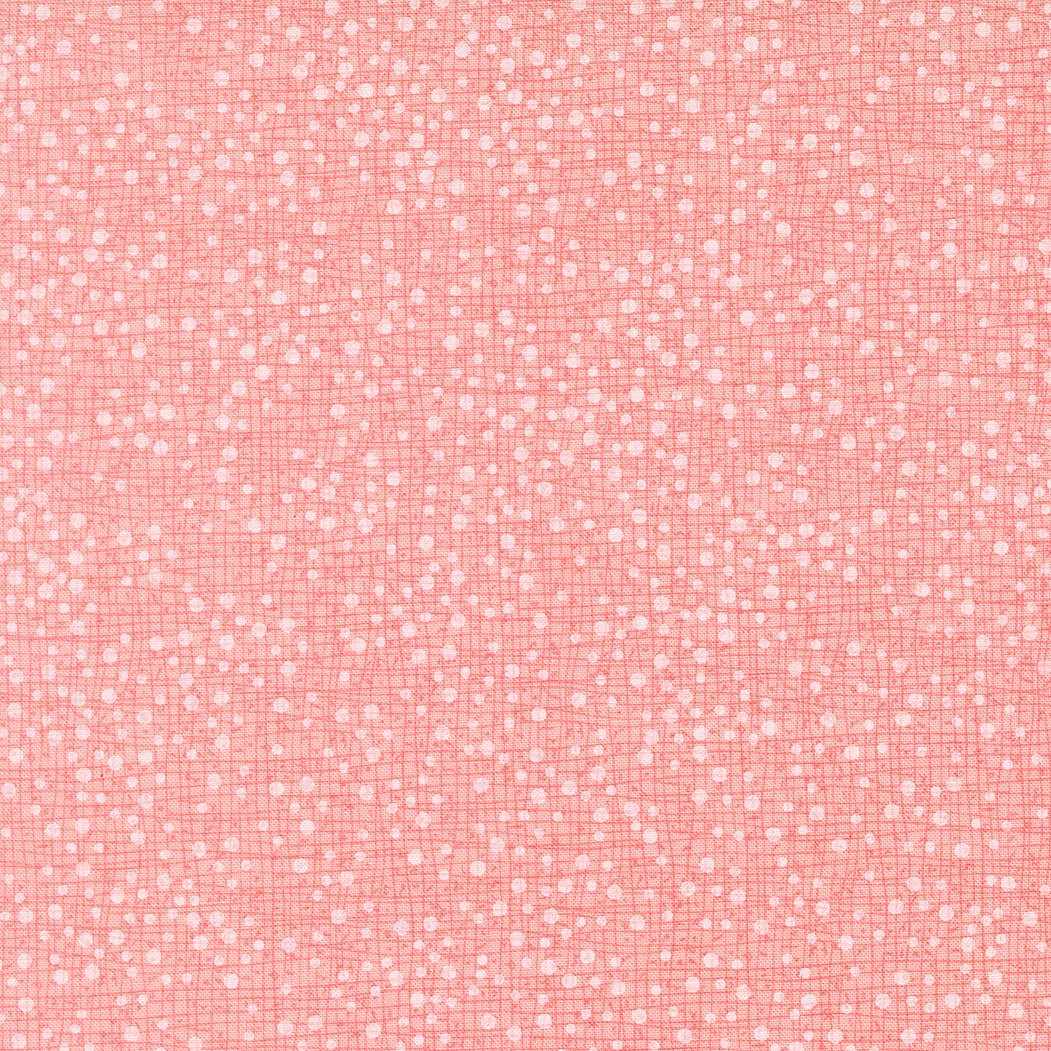 Pink fabric texture with a subtle pattern