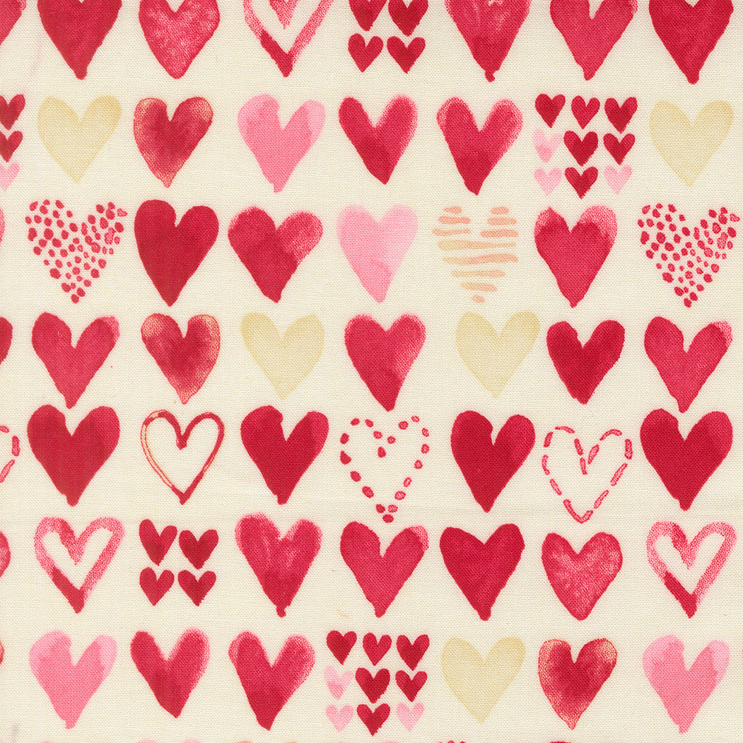 Pattern of red, pink, and beige hearts on a light background