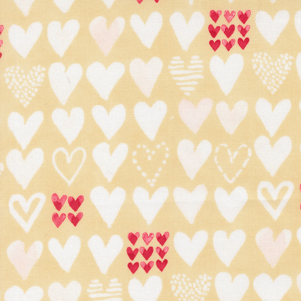 Pattern of white and red hearts on a beige background