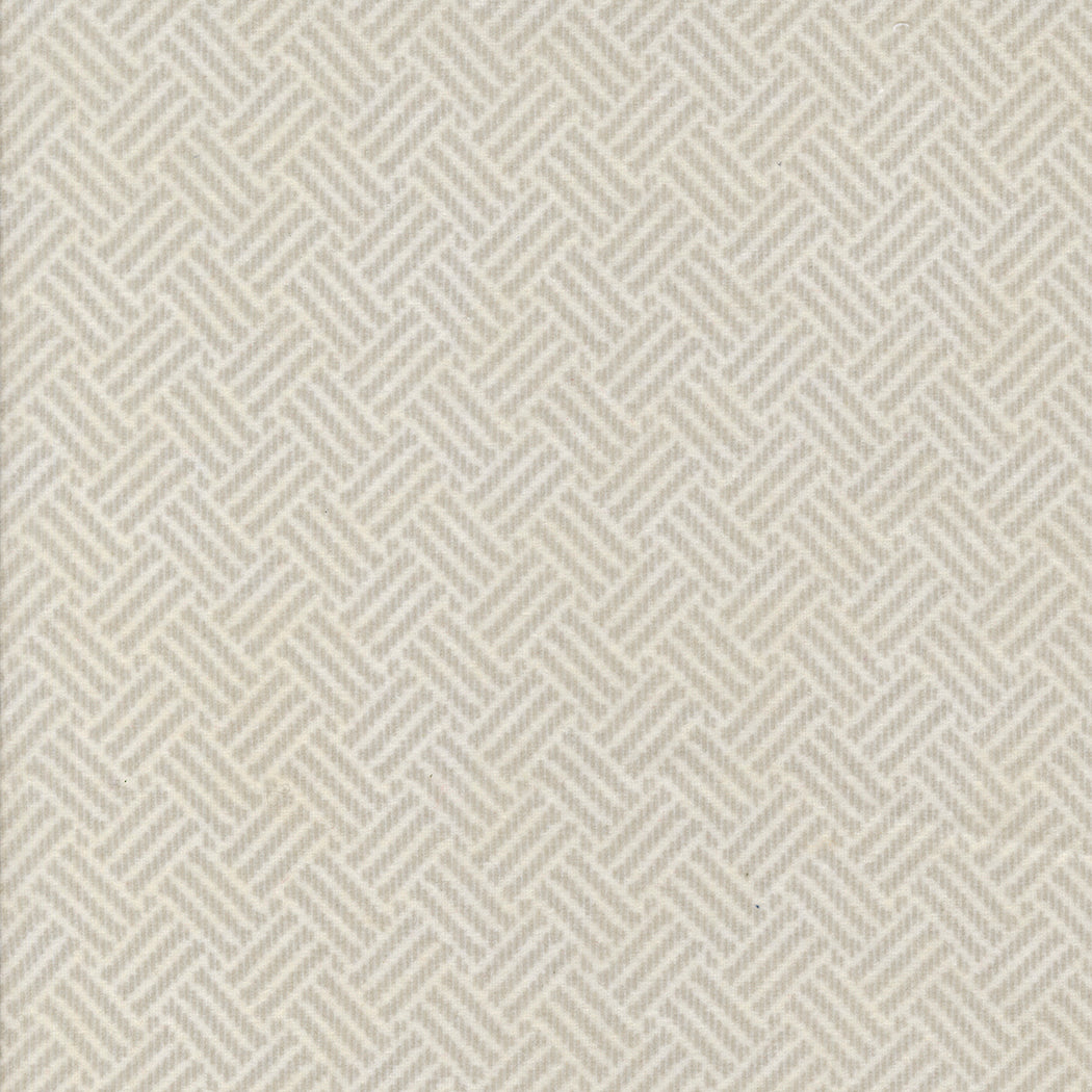 Textured patterned fabric swatch in beige color