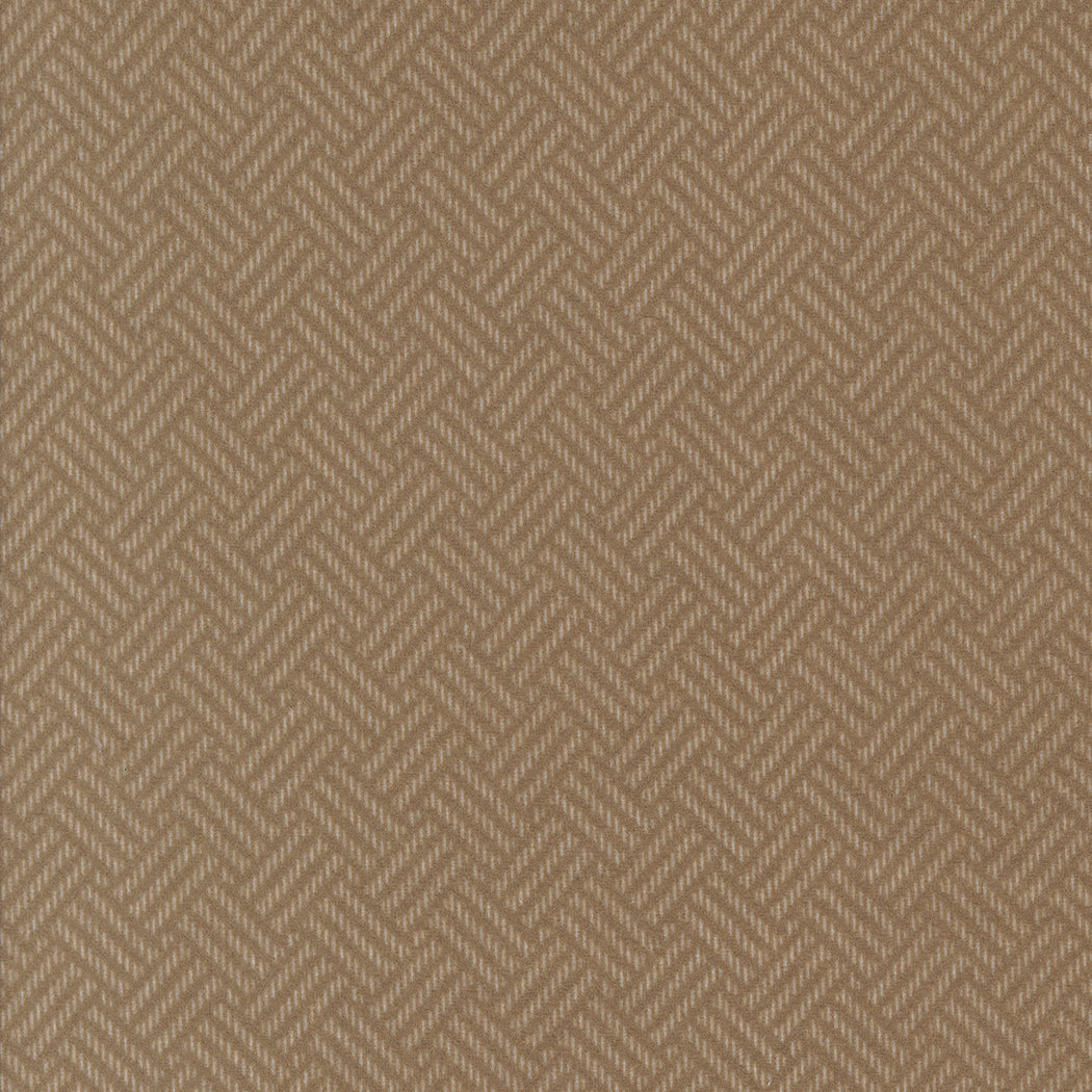 Brown herringbone patterned fabric texture