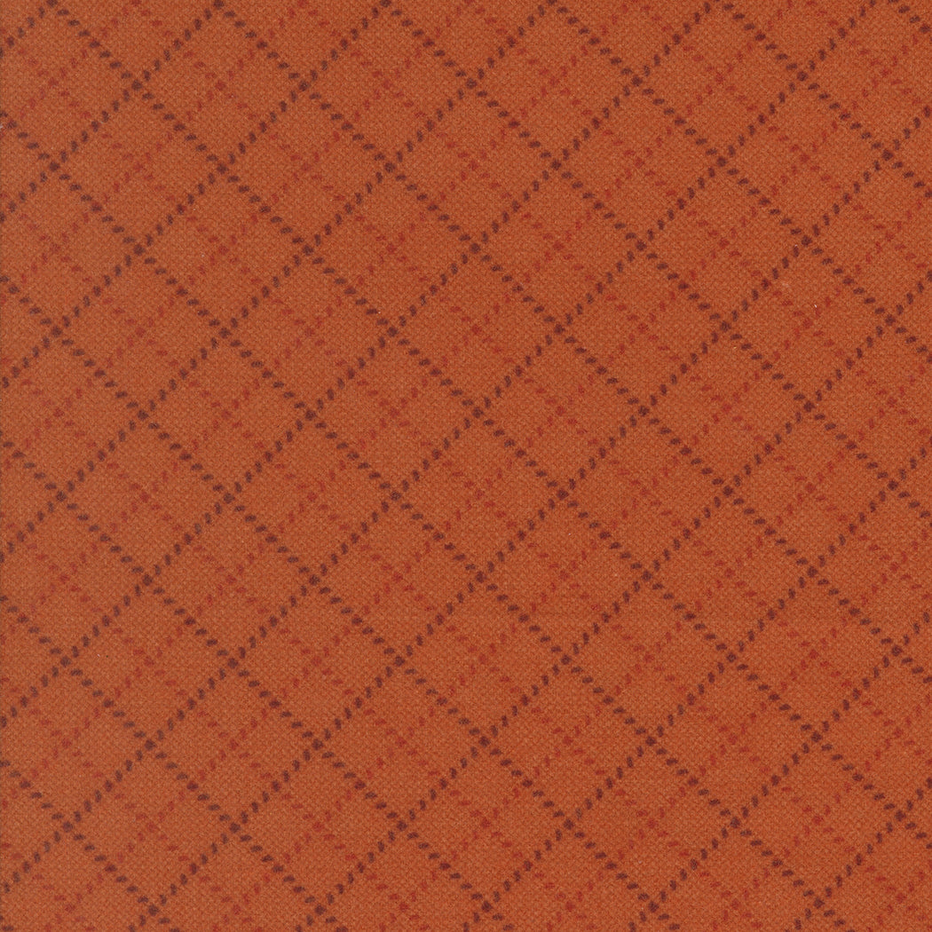 Brown fabric texture with a diamond pattern