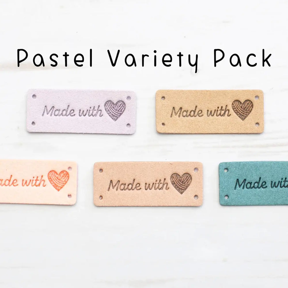 Pastel variety pack of labels with 'Made with love' text on a white background