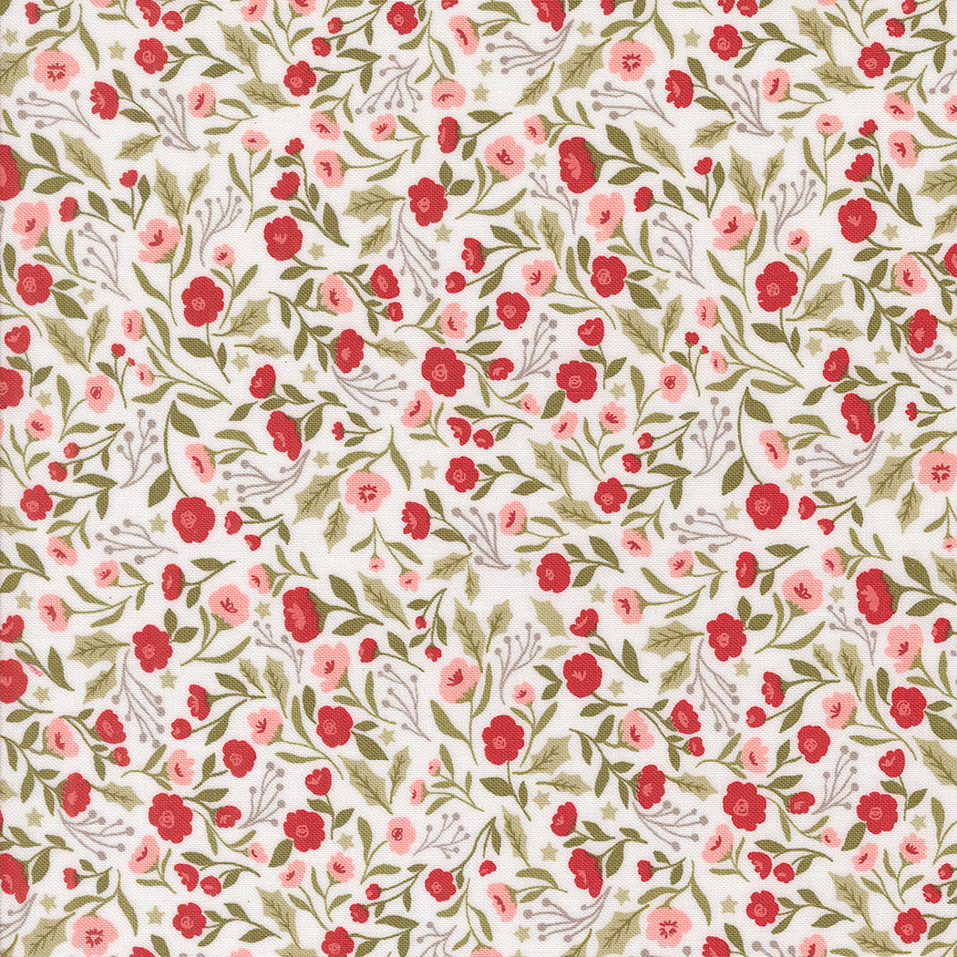 fabric swatch with small red and pink posy flowers and greenery on a white background