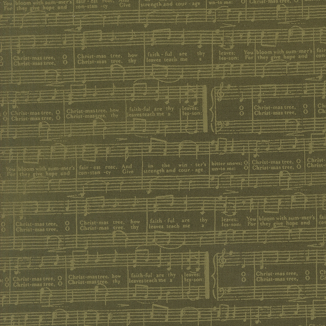 fabric swatch with a light green print of sheet music for the song "O Christmas Tree" on a darker green background