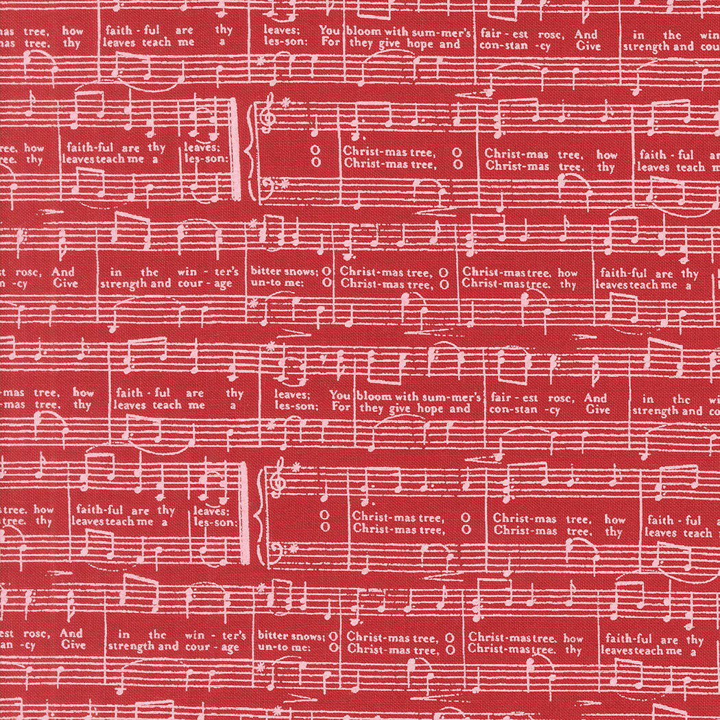 fabric swatch with a white print of sheet music for the song "O Christmas Tree" on a red background