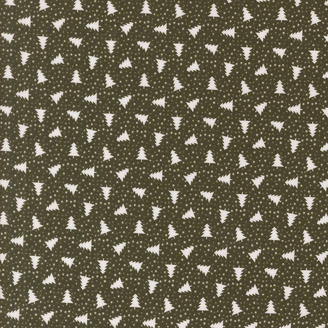 fabric swatch with a pattern of small white silhouettes of Christmas trees and dots on a dark green background