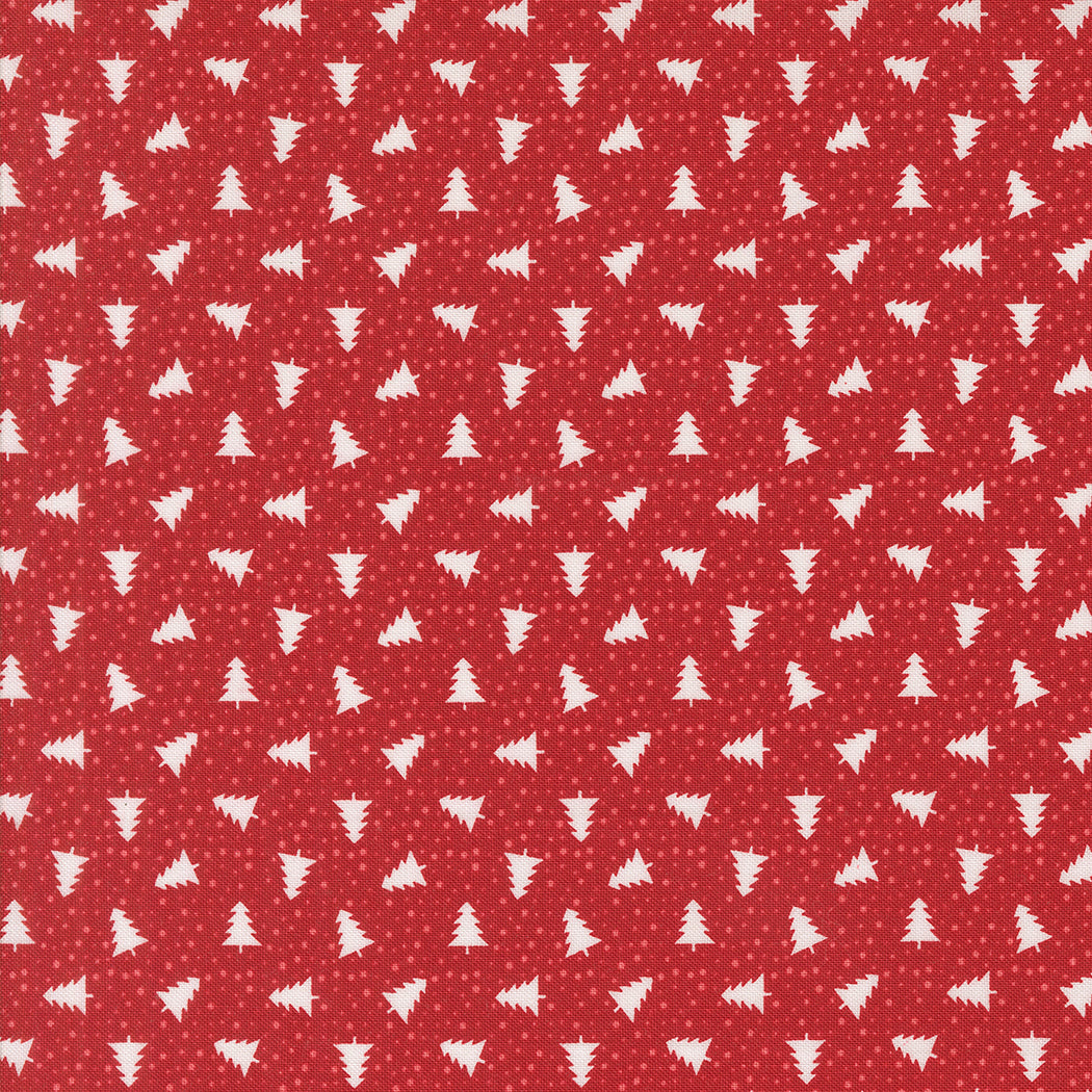 fabric swatch with a pattern of small white silhouettes of Christmas trees and dots on a red background