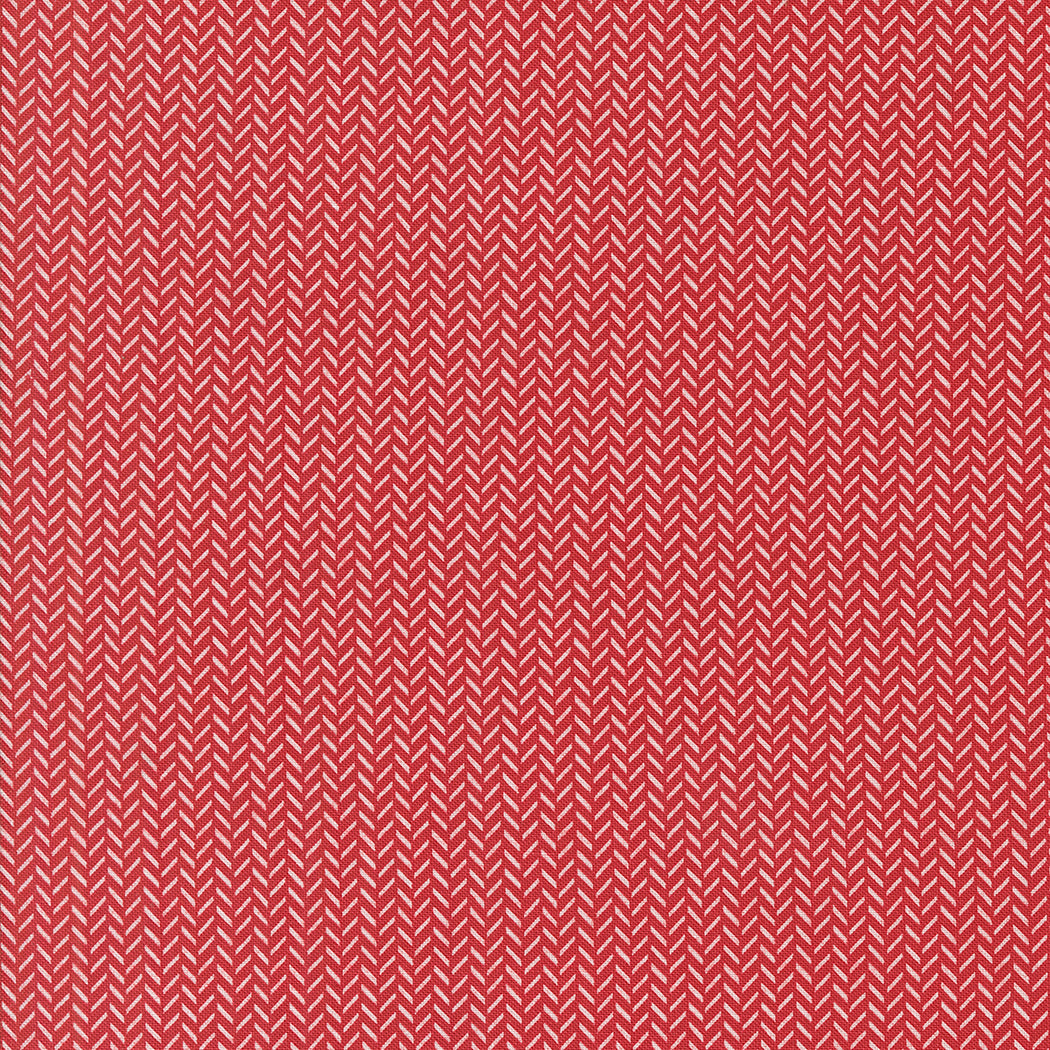 fabric swatch of a small vertical herringbone print in red and white
