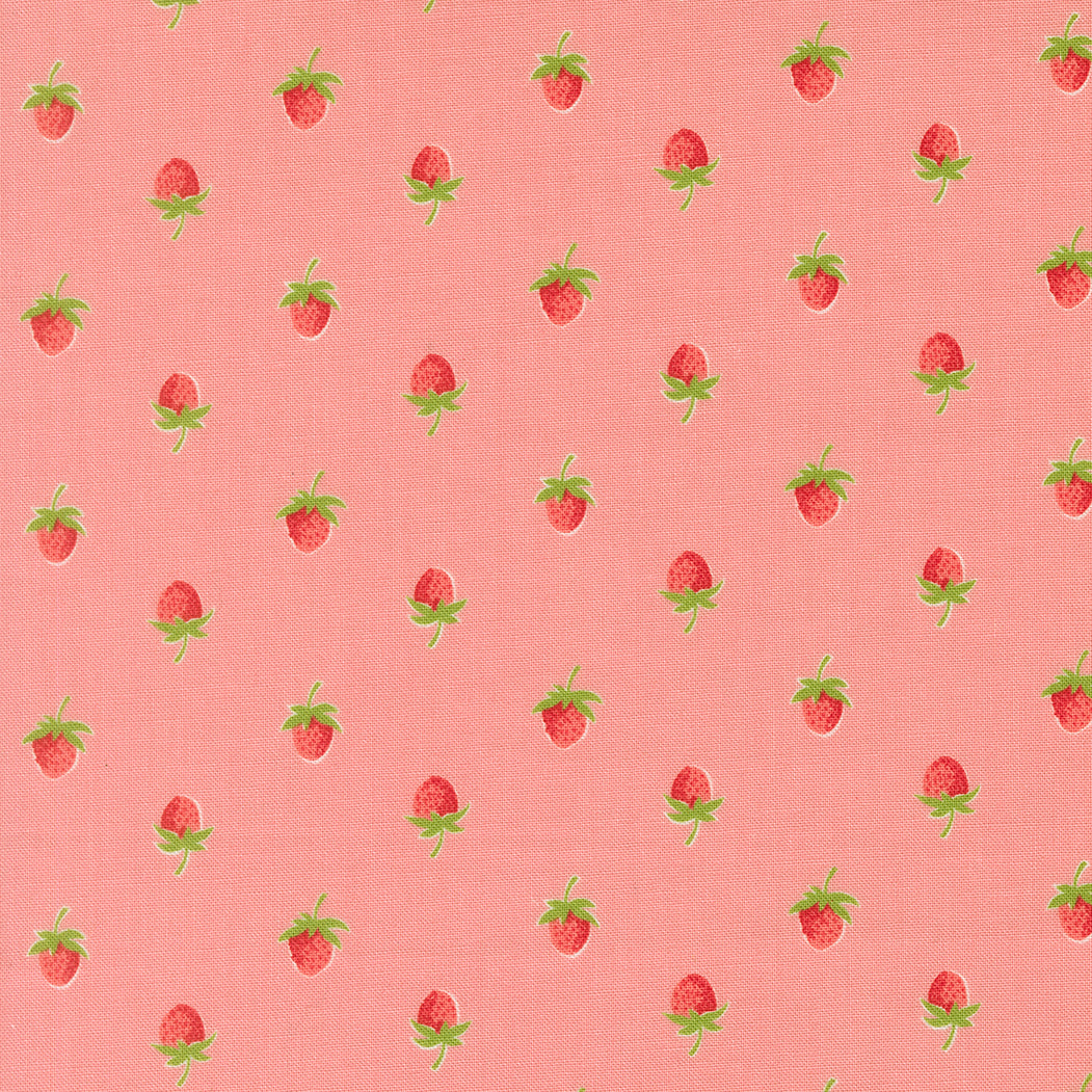 Pattern of strawberries on a pink fabric background