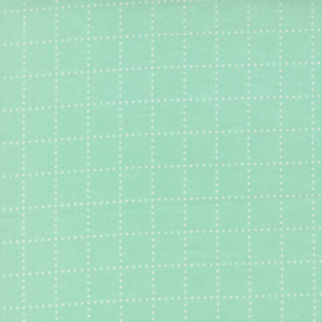 Mint green fabric with a small white checkered pattern