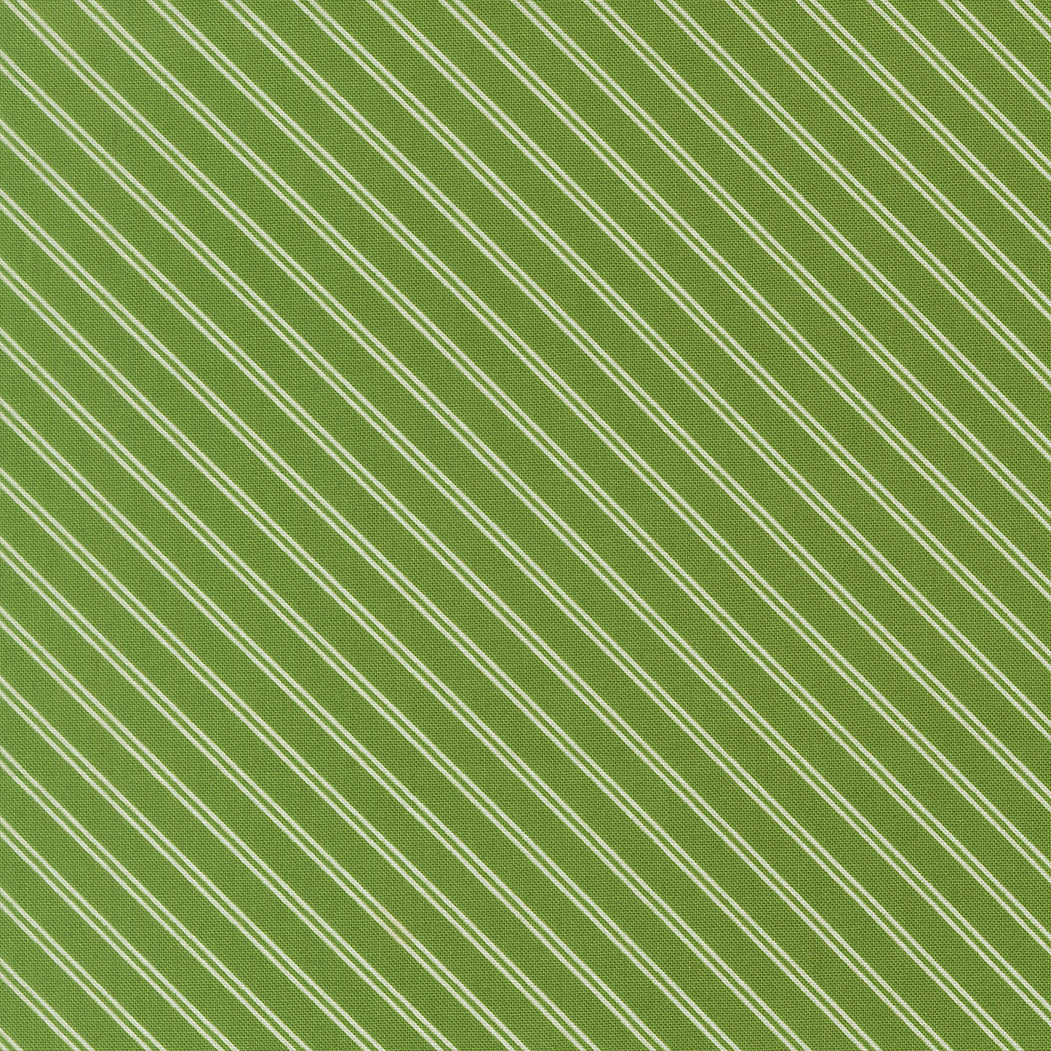 Green fabric texture with diagonal white stripes