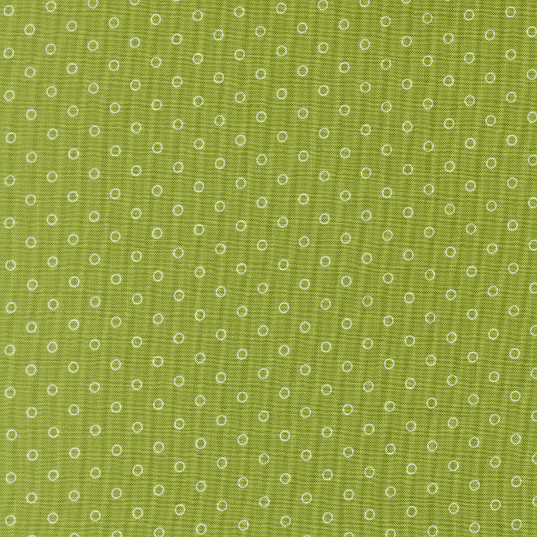 Green fabric with small white circle pattern