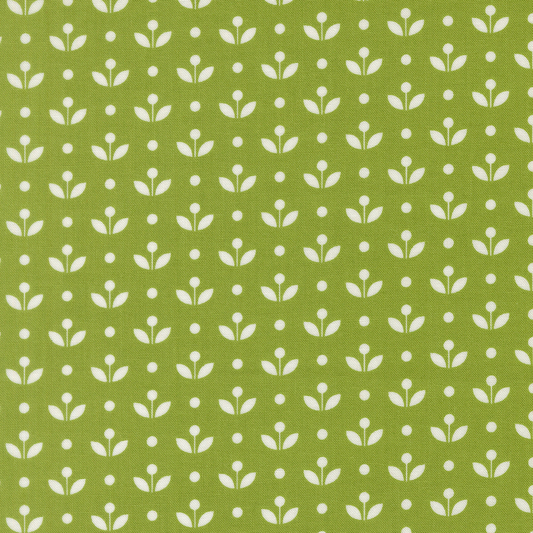 White floral pattern on a green background
