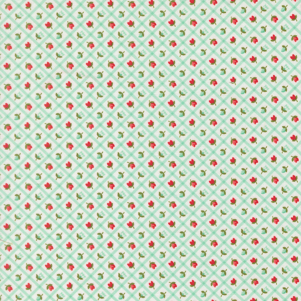 Pattern of small red flowers on a green background