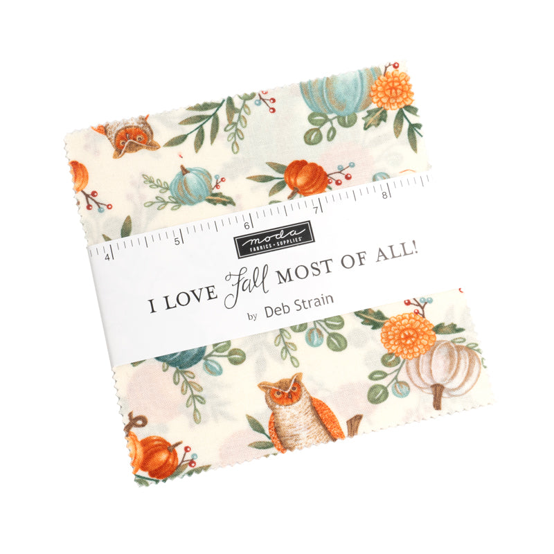 Fabric bundle with autumn-themed design featuring pumpkins, leaves, and an owl, with a MoMA label.