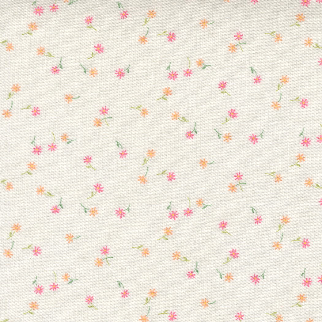 Pattern of small pink flowers on a light beige background