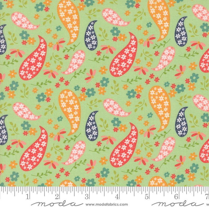 Green background with red, pink, blue, orange paisley design