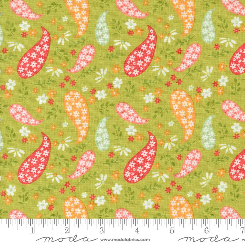 Green background with red, pink, orange paisley design