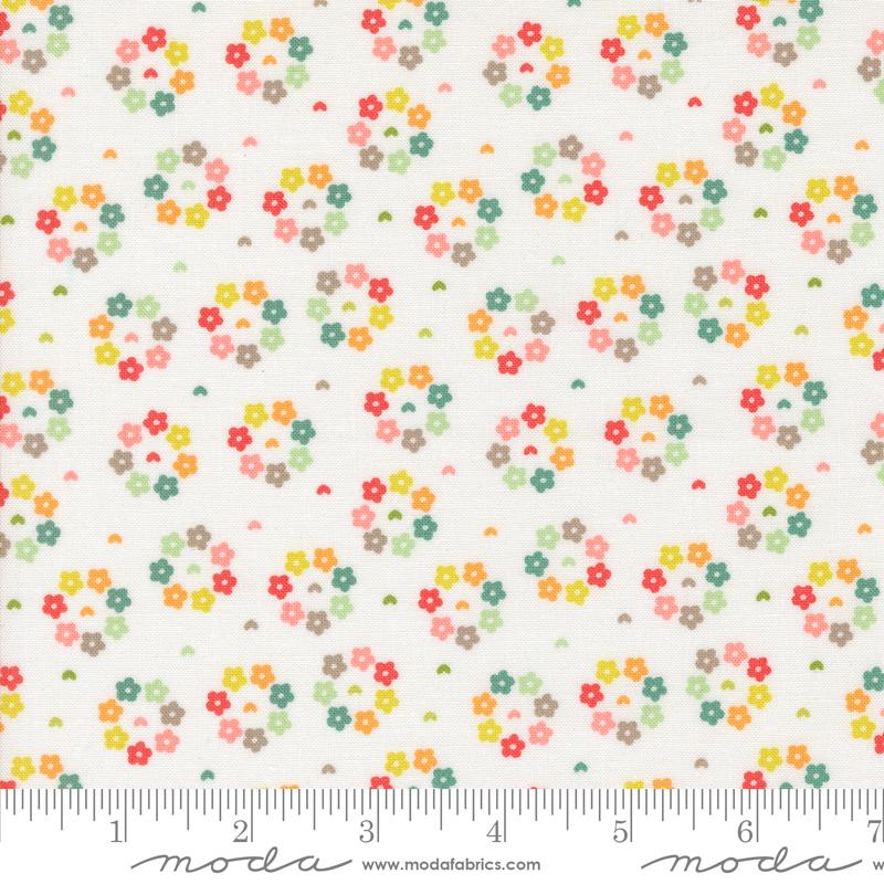 White fabric with colorful flowers