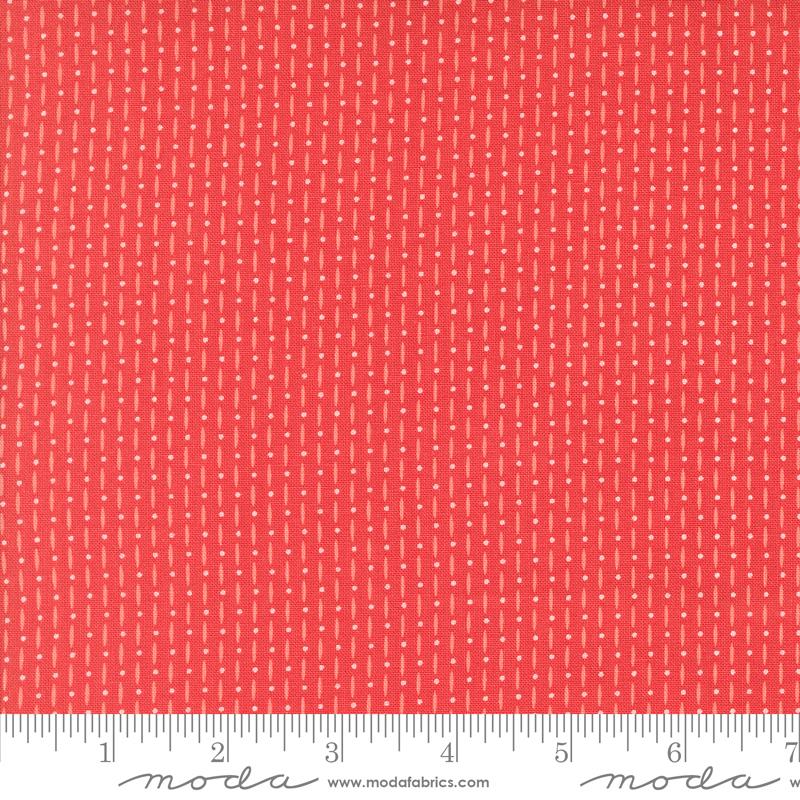 Red fabric with lines and dots