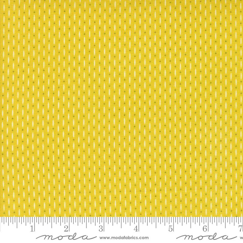 Yellow blender fabric with small lines and dots