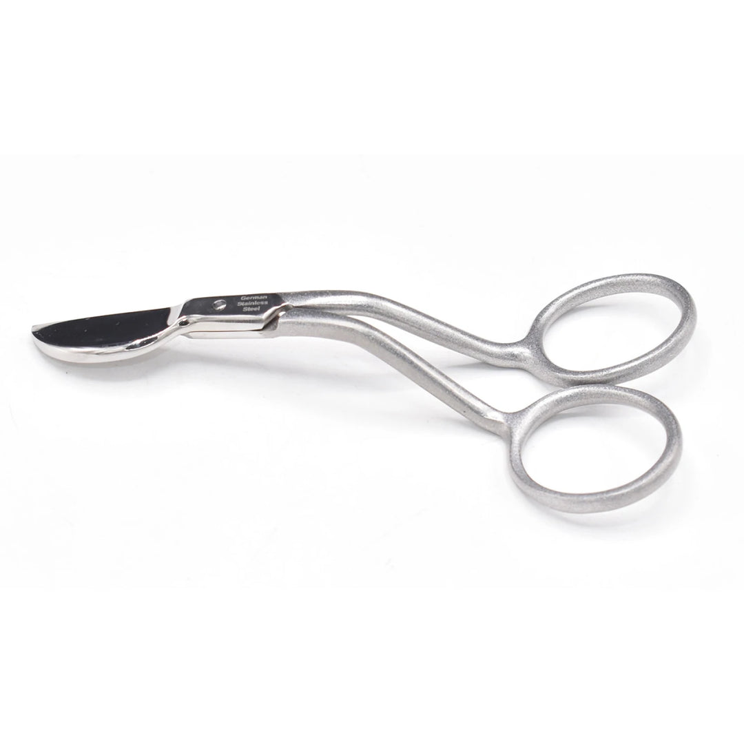 Metallic shears on a white background