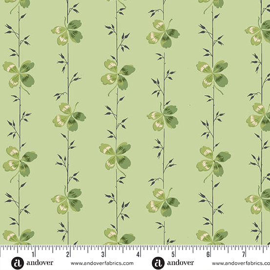 Green fabric with 4 leaf clovers in a stripe