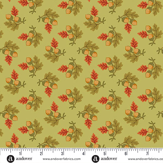 fabric swatch with a geometric pattern of various bunches of acorns with green and red leaves on a lighter green background