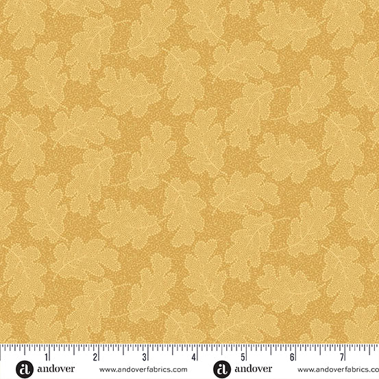 fabric swatch with a geometric pattern of golden yellow oak leaves on a slightly darker yellow textured background