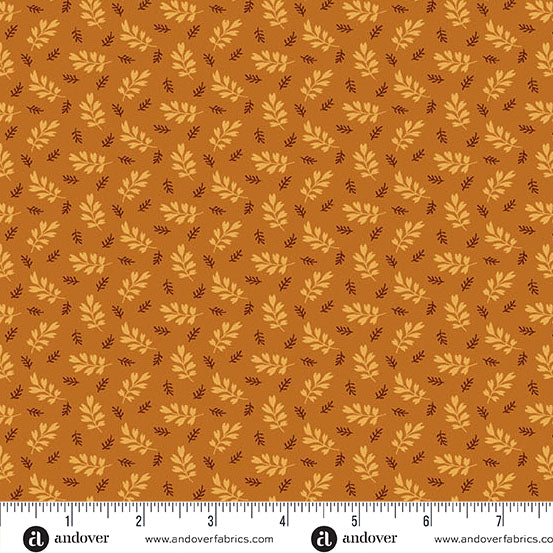 fabric swatch with a geometric pattern of light orange and brown leaf sprigs on a darker orange background